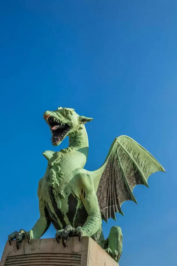 Statue of dragon on the bridge, symbol of Ljubljana, Slovenia