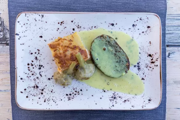 Steak au poivre with gratin dauphinois, top view. At Villa Vegana restaurant, Selva, Mallorca