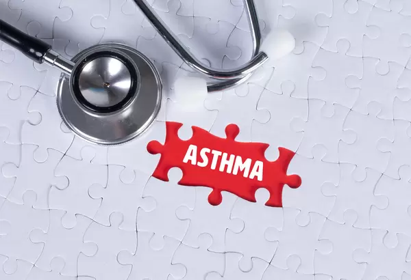 Stethoscope and missing puzzle with a Asthma text