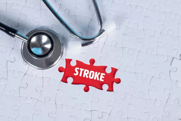 Stethoscope and missing puzzle with a Stroke text