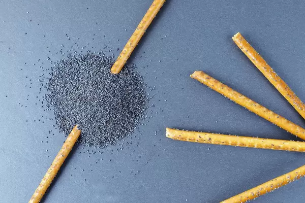 Sticks with poppy seeds, close-up view