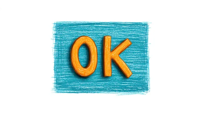 Stilisiertes Textfoto mit 'OK'-Symbol in Leuchtfarbe