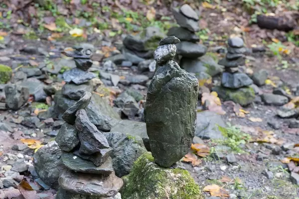 Stone figures as symbol of the group spirit, created by the Alpbach secondary school and complemented by hikers