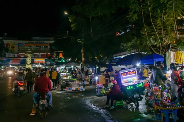 Street Food Carts and Stores lining up at the Night Market in Dalat, Vietnam