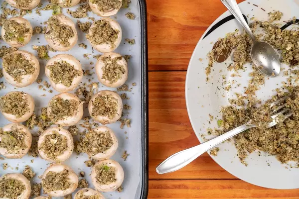 Stuffed Mushrooms with Cheese and Parsley prepared for baking