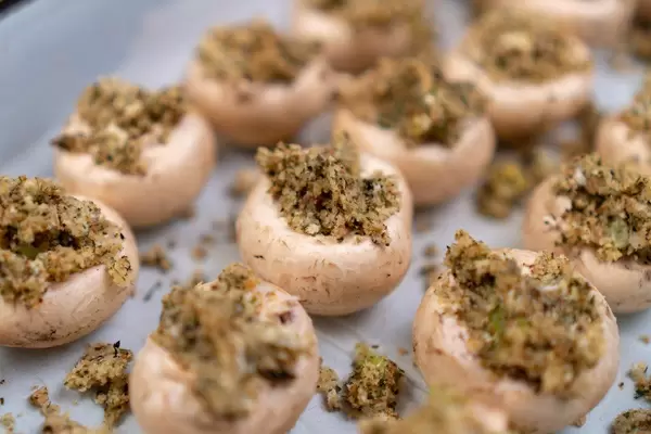 Stuffed Mushrooms with Cheese and Parsley ready for baking