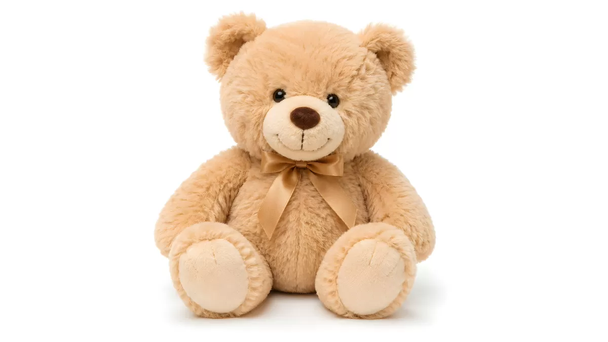 Süßer Teddybär mit Schleife auf weißem Hintergrund