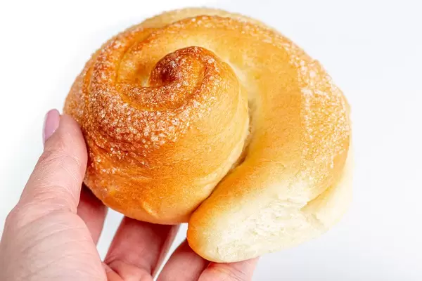 Sugar bun in a woman's hand