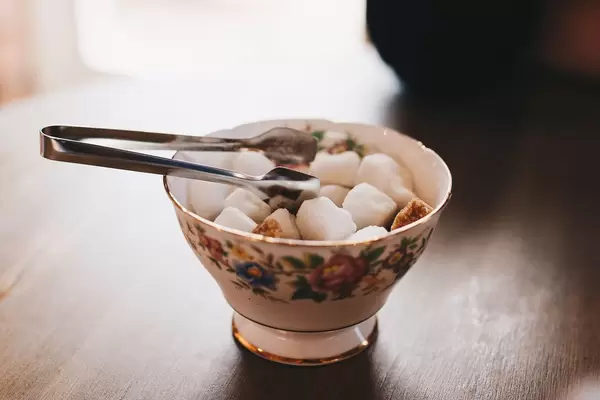 Sugar pot with sugar cubes in a cafe