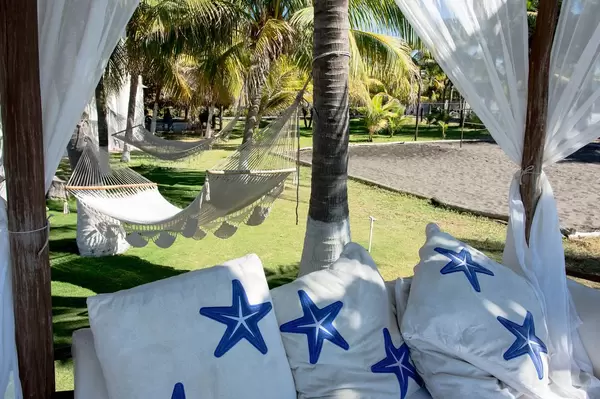 Sunbed and hammocks in a chalet