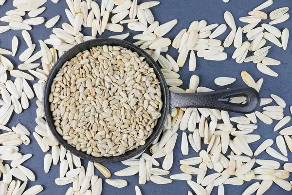 Sunflower seeds in a small pan
