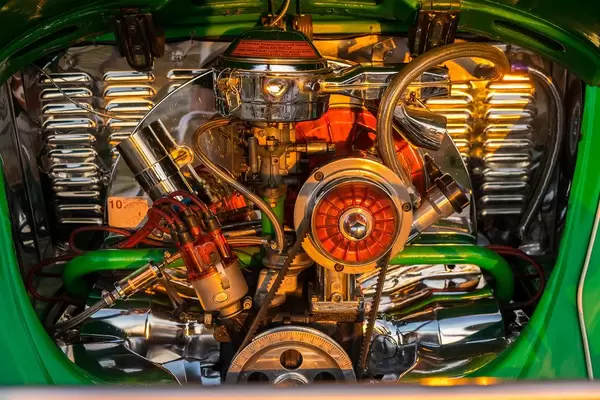 Sunset colors hitting a Volkswagen enginer