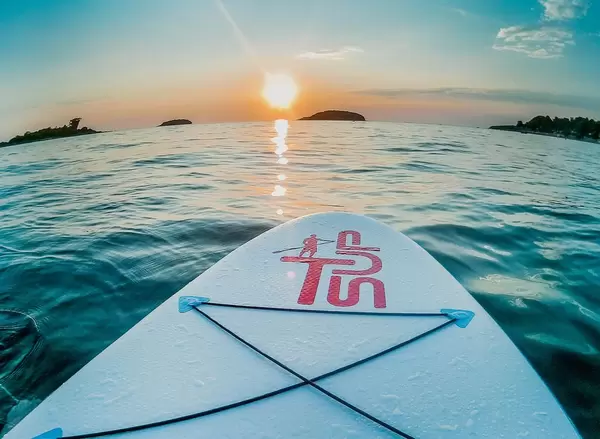 Sunset stand up paddling