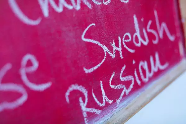 Swedish, among many foreign languages written with chalk, school chalkboard