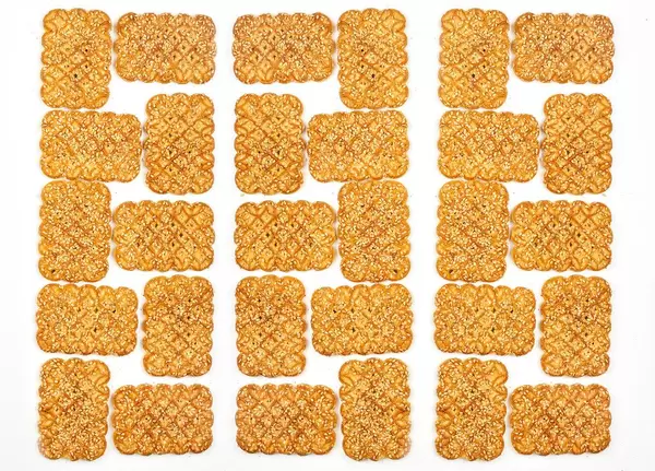Sweet cookies puzzle on white