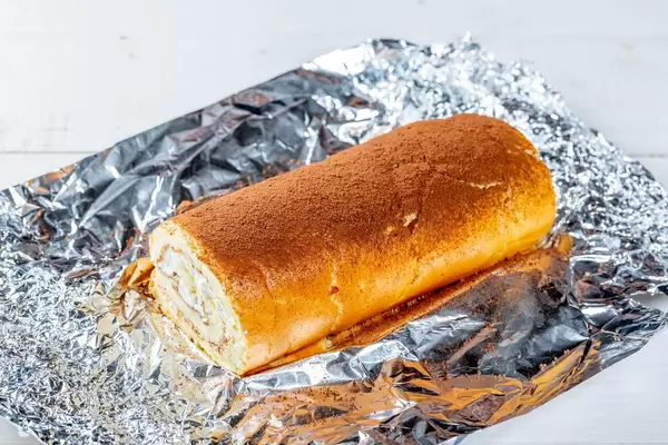 Sweet homemade biscuit roll with cream