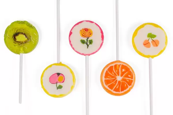 Sweet set of lollipops on white background