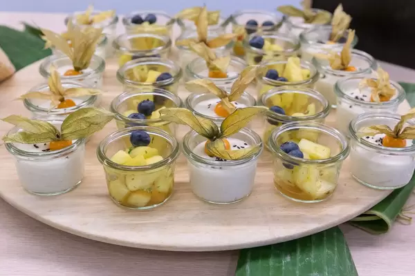 Sweet sticky rice with coconut milk and sesame & marinated pineapple, sweet and sour at the OMWest Barcamp of AXA in Cologne, Germany