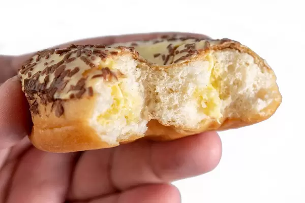 Sweet Vanilla Donut in the hand