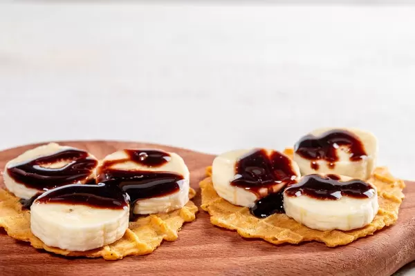 Sweet waffles with slices of fresh banana (Flip 2019)