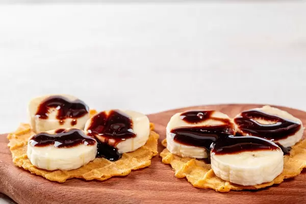Sweet waffles with slices of fresh banana