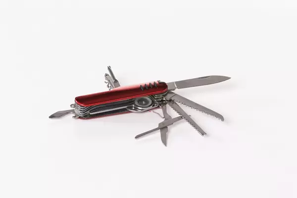 Swiss army knife on white background