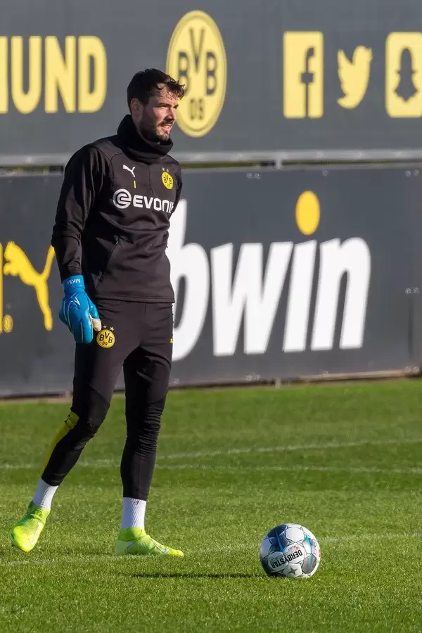Swiss goalkeeper of Borussia Dortmund, Roman Bürki, with the ball during a public training