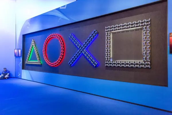 Symbols of the Playstation buttons as illuminated lettering at the video games fair Gamescom