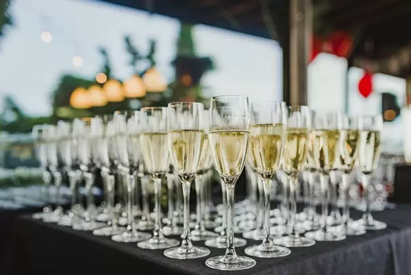 Table Of  Freshly Filled Champagne Glasses (Flip 2019)