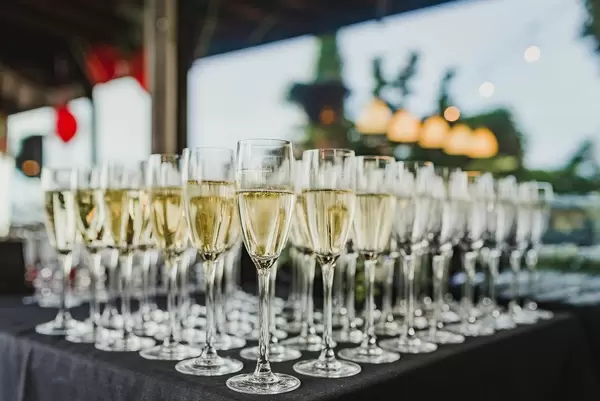 Table Of  Freshly Filled Champagne Glasses