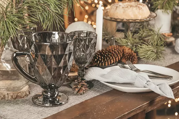 Table served for christmas dinner in living room, close up view