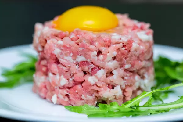 Tartare with egg yolk