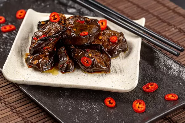 Tasty and spicy eggplant with hot pepper sauce