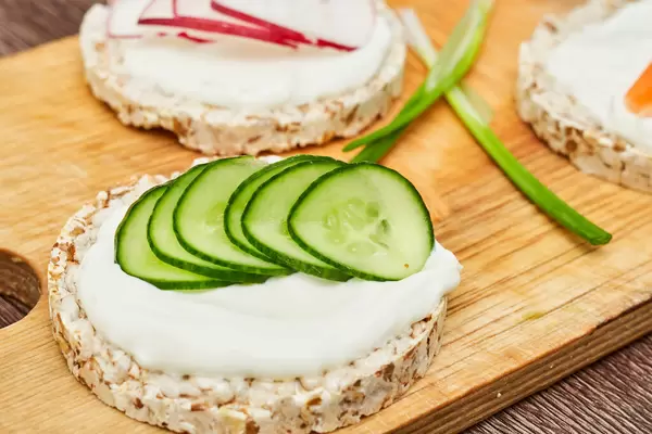Tasty breakfast - sandwich with crispbread and cucumber.