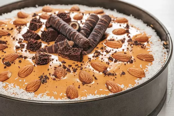Tasty chocolate cake with almonds and chocolate (Flip 2019)