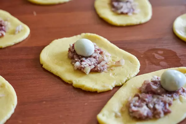 Tasty dumplings with meat and quail eggs