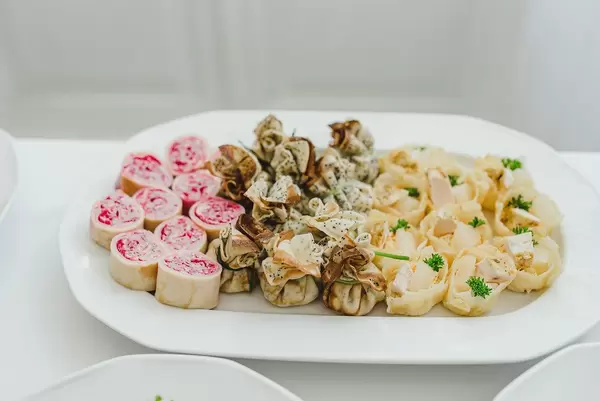 Tasty Roll Appetizers On A White Plate (Flip 2019)