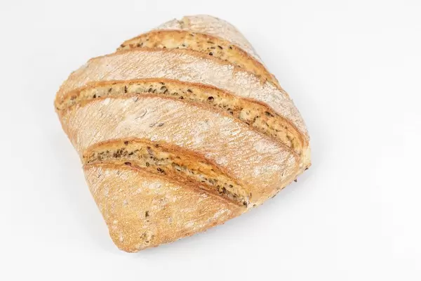 Tasty rustic bread isolated above white background (Flip 2019)