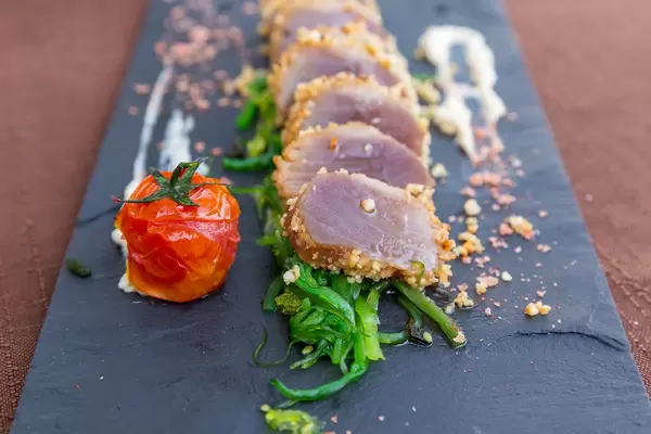 Tataki cooking: red tuna seared outside but raw inside. Served in almond crust at Q11 in Pollença