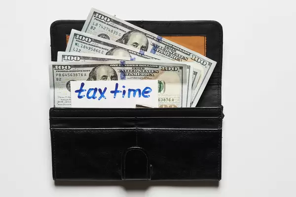 Tax time - a wallet with us dollars and note