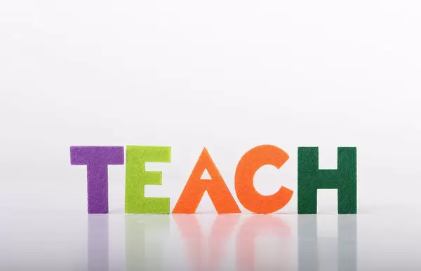 Teach text on white background