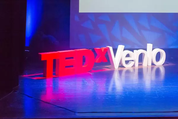 TEDxVenlo sign on the stage