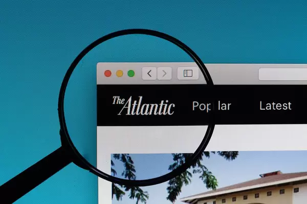 The Atlantic logo under magnifying glass