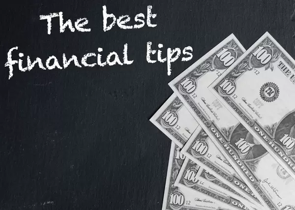 The best financial tips text with US dollar banknotes
