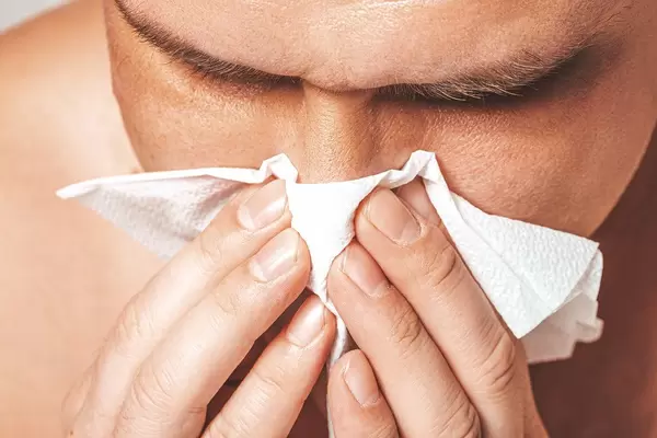 The concept of ill. The man blows his nose into a napkin (Flip 2019)