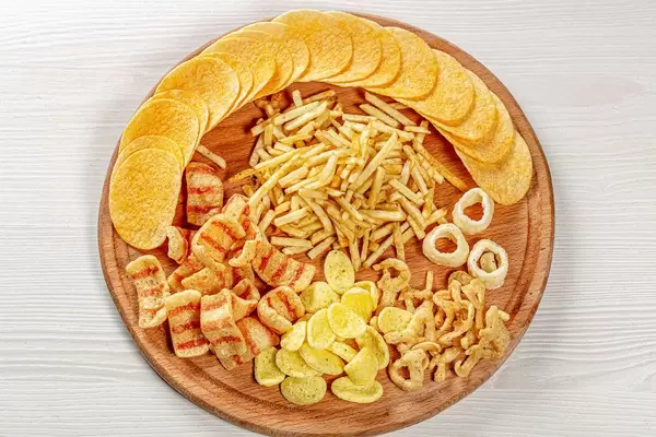 The Concept Of The Oktoberfest. A set of different snacks for beer. Top view