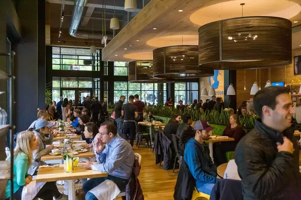 The crowded interior of the True Food Kitchen restaurant in Chicago, inspired by the philosophy that "Better food makes better living" and based on the principles of the anti-inflammatory diet