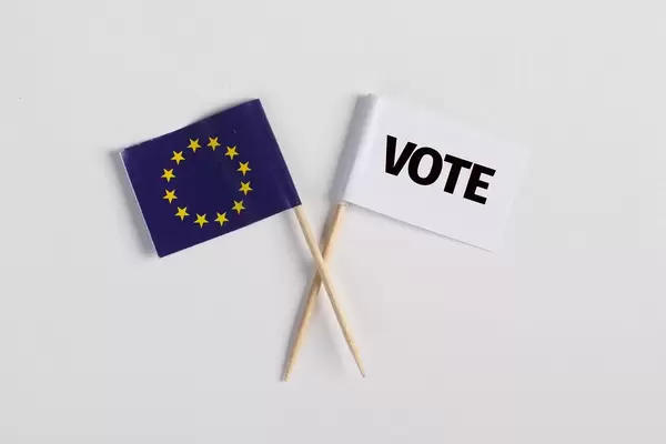 The European flag and white flag with vote text on white background