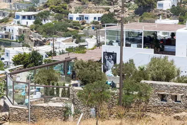 The famous Nusr-et steakhouse on the hill next to the windmills on Mykonos, Greece