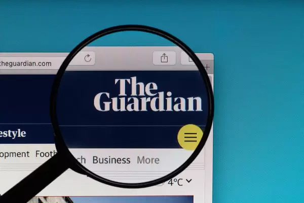 The Guardian logo under magnifying glass